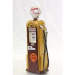 Metal model of a vintage Shell petrol pump