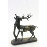 After Mene large bronze sculpture of a deer by tree unsigned.