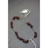 Cherry amber bakelite necklace