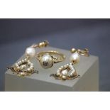 Pair of 9ct Gold & Pearl earrings and a similar unmarked ring, the pearl set with a Diamond