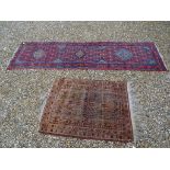 Two Eastern Red Ground Wool Rugs