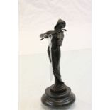 A bronze figure of a lady violinist.