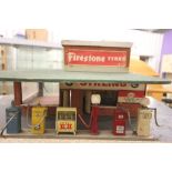 Scratch built Firestone Tyres petrol station with pumps and fore court