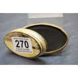 A antique oval horn snuff box.