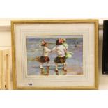 Gilt framed oil of girls playing on a beach