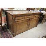 19th century Large Oak Continental Cupboard flanked by ormolu mounted columns with two panel doors