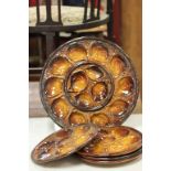 St Clement, France 37cm brown glazed Majolica oyster platter with four matching plates (one