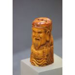 Bone netsuke of a man with scroll