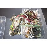 Plastic tub of Costume jewellery