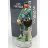 Glen Campbell Scotch Whisky decanter in the form of a clansman figure with contents and original