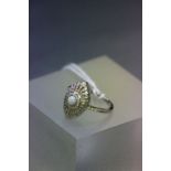 A silver CZ art deco style ring with central opal