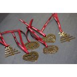Six George Jensen gold tone Christmas decorations with ribbons