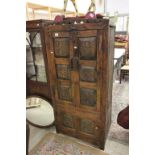 Hardwood Cupboard, the two doors with carved panels opening to reveal shelves