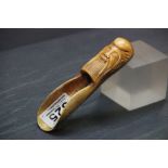 Oriental bone scoop spoon / apple corer with wise man to handle