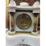 White marble 19th century mantle clock, inverted front design an 8 day movement striking on a