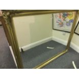 Large modern gilt overmantle mirror with bevelled edged glass, 4' tall x 4'6 long in the antique