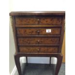 French figured walnut works table with gilt highlights to feet and body a cluster of 4 short drawers