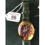 Commemorating the Olympic Games, a decorative watch by Nonet, Coenaho CCCP, Russian with green