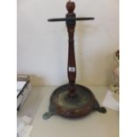 Mid-19c stick stand with swivel action circular top on tripod animal supports