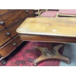 Early 19th century card table, rectangular shaped swivel top below a platform base with scrolling