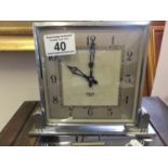 Vintage chrome bound Smiths Art Deco period mantle clock, 4.5" square dial on a separated chrome