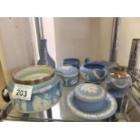 Shelf of Wedgwood Jasper ware inclduing a silver rimmed basin with a h/m 1903, Ronsen lighter, 11