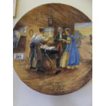 Signed hand painted charger entitled Gretna Green, signed T Ridgway, the picture depicting a runaway