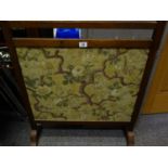 Edwardian period fire screen with a tapestry front are, a picture of Birds, Twigs and Trees, with