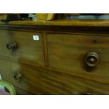 Victorian mahogany Gentleman's chest comprising 2 short and 3 graduating long drawers with turned
