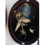 Oval pair of vintage Shibayama plaques each one decroated with birds amoung lotus branches and