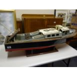 Large hand made model of a boat named S33 Ship with small petrol engine to the centre, will need