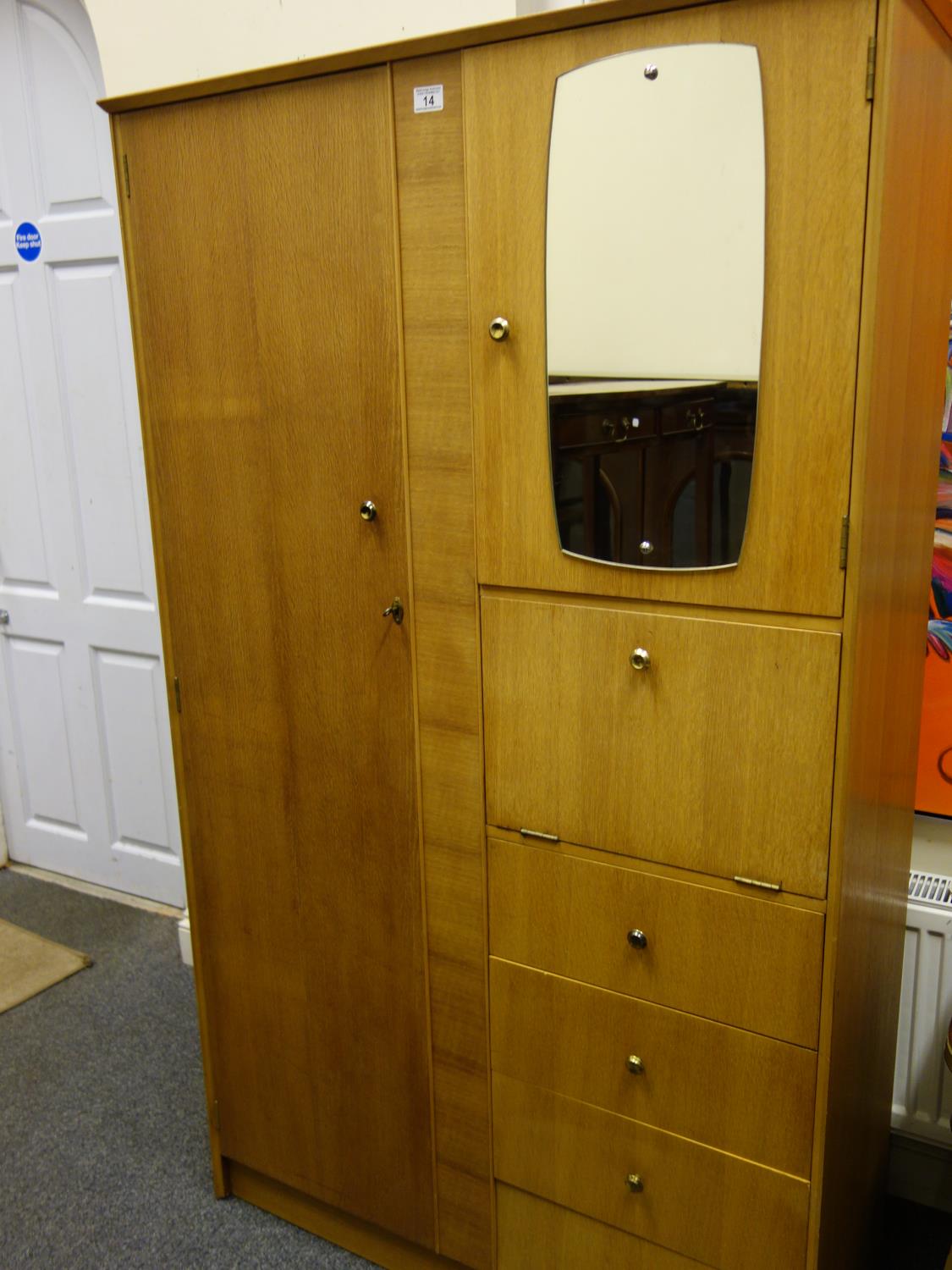 1960's ply wood compactum unit with accompanying bedside table, a cluster of drawers and a single
