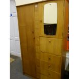 1960's ply wood compactum unit with accompanying bedside table, a cluster of drawers and a single