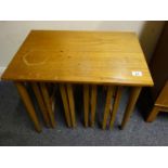 Nest of 4 x 1970's teak tables on castors, nest of 3 tables below a single coffee table 2' long x