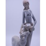 Lladro style group made in Spain, young girl holding sheep and stroking a standing sheep, 12" tall