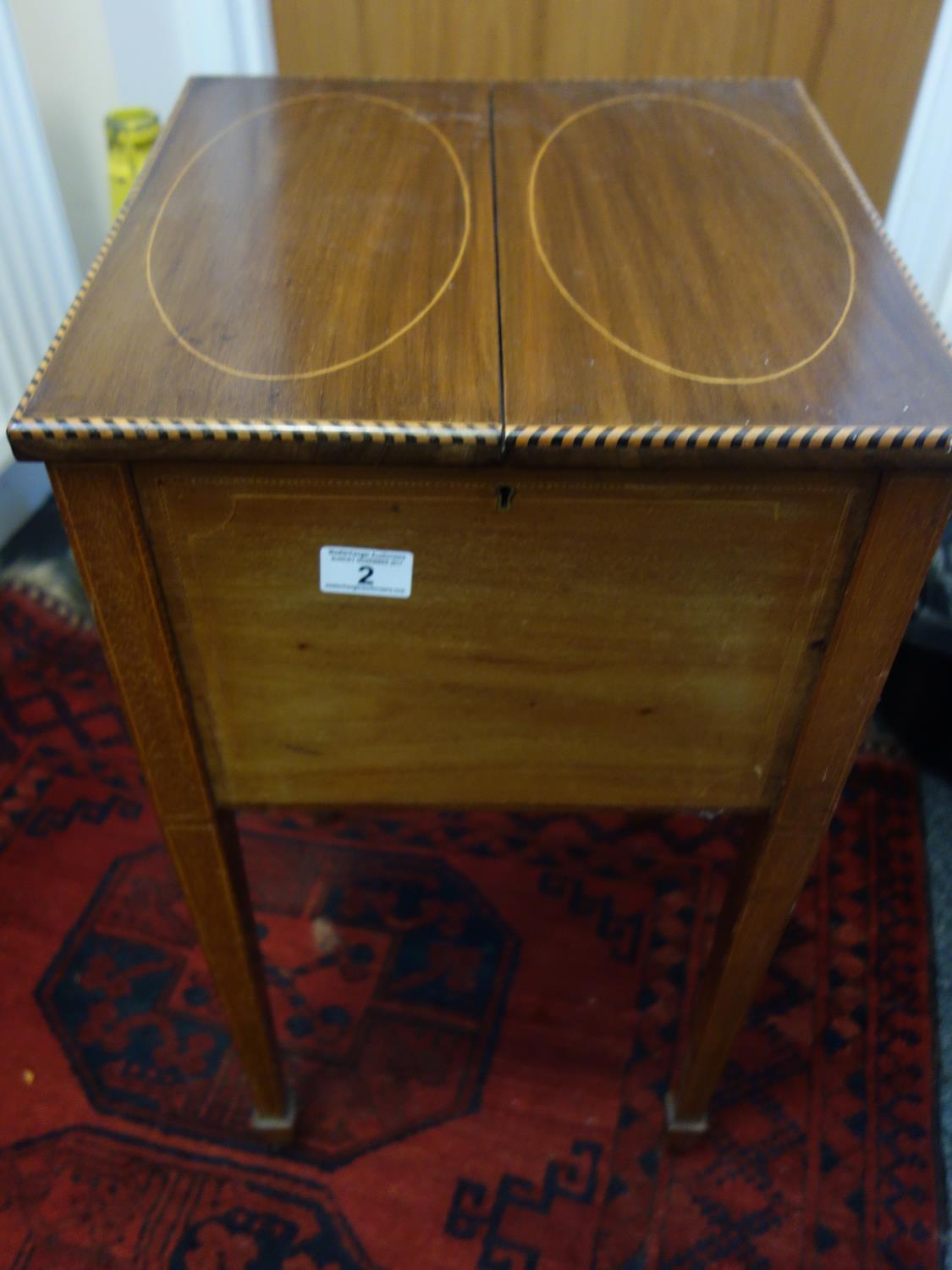 Delicate Victorian period mahogany sewing box on stand, inlaid decoration twin opening flaps top the
