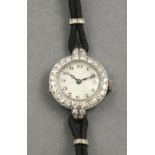 A vintage Art Deco Vertex diamond set cocktail watch, the white dial set out with Arabic numerals