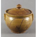 Michael CARDEW (British 1901-1983) Honey and brown glazed twin lug handle casserole with a celadon