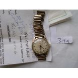 9CT TUDOR OYSTER GENTS WRIST watch on 9ct strap together with a bill of sale and other paperwork