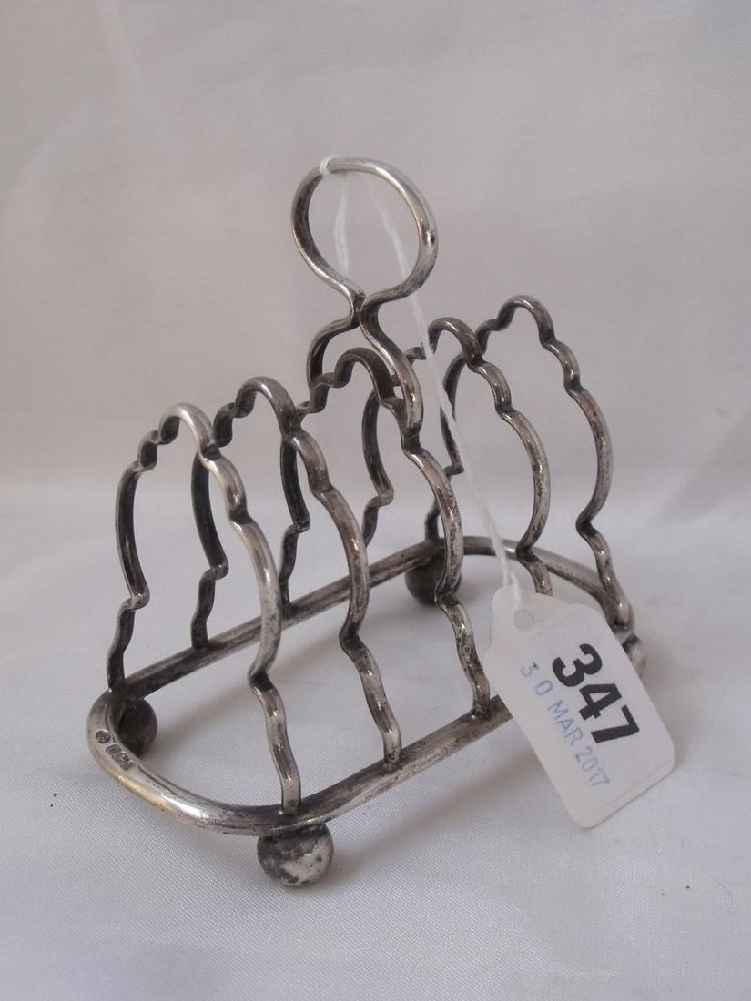 A four division shaped bar toast rack 4” wide Sheff 1902 by WHS 110g