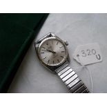 A GENTS SS ROLEX OYSTER PRECISION wristwatch with a repair receipt in Rolex sleeve