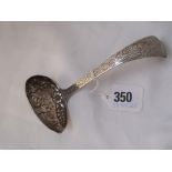 A Dutch sauce ladle the bowl embossed with angling figures 50g