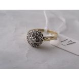 A good 18ct gold diamond cluster ring size M
