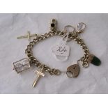 9ct charm bracelet set with seven various gold charms 37g inc