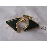 A pair of heavy large green stone set shield shaped cufflinks mounted in gold 16.9g inc