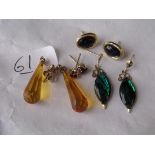 Four pairs of gold mounted earrings