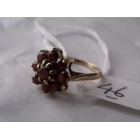 Garnet cluster ring mounted in 9ct size M