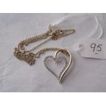 A 9ct & diamond witches heart pendant on 9ct chain 2.7g