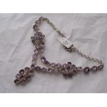 An impressive heavy silver mounted Amethyst set necklace consisting of 49 large faceted rectangular,
