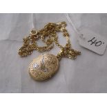 An attractive 9ct solid locket embossed with bird & foliage on 9ct fancy 20” chain 4.5g